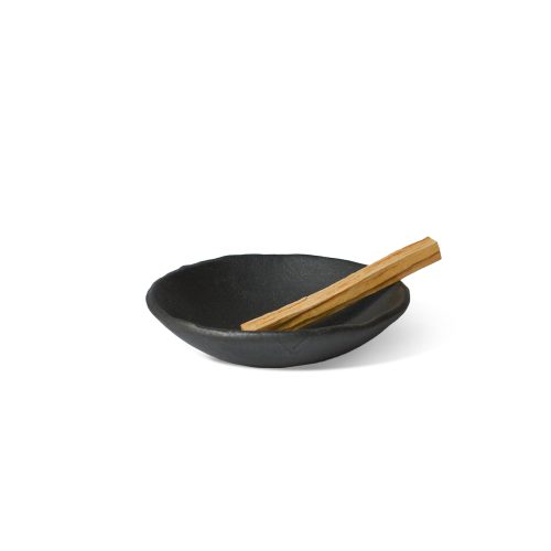 raw black clay incense bowl and smudge stick